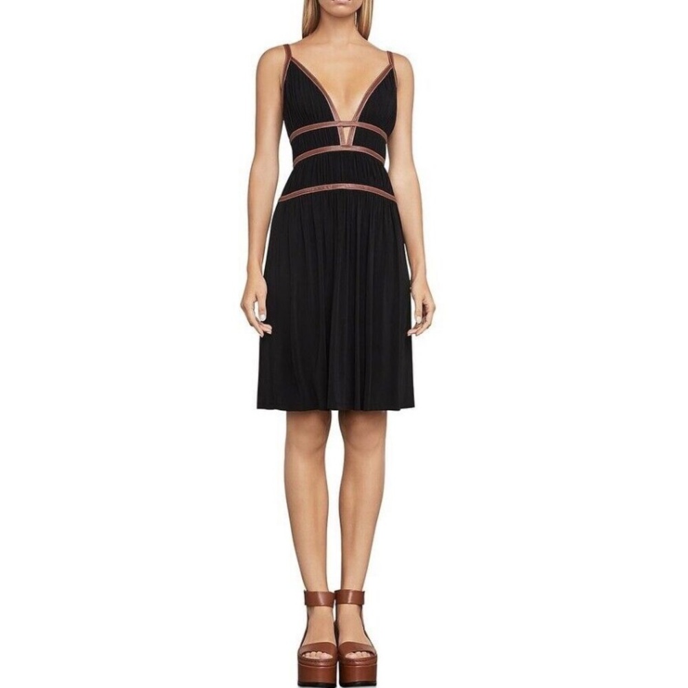 Knee length, low cut dress by BCBG.
